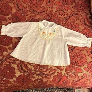 Vintaged baby cotton top embroidered front neckline accordion pressed pleats.